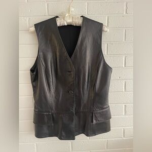 Black vest. Buttery, supple leather, 2 waistcoat pockets, peblum-like cut. EUC